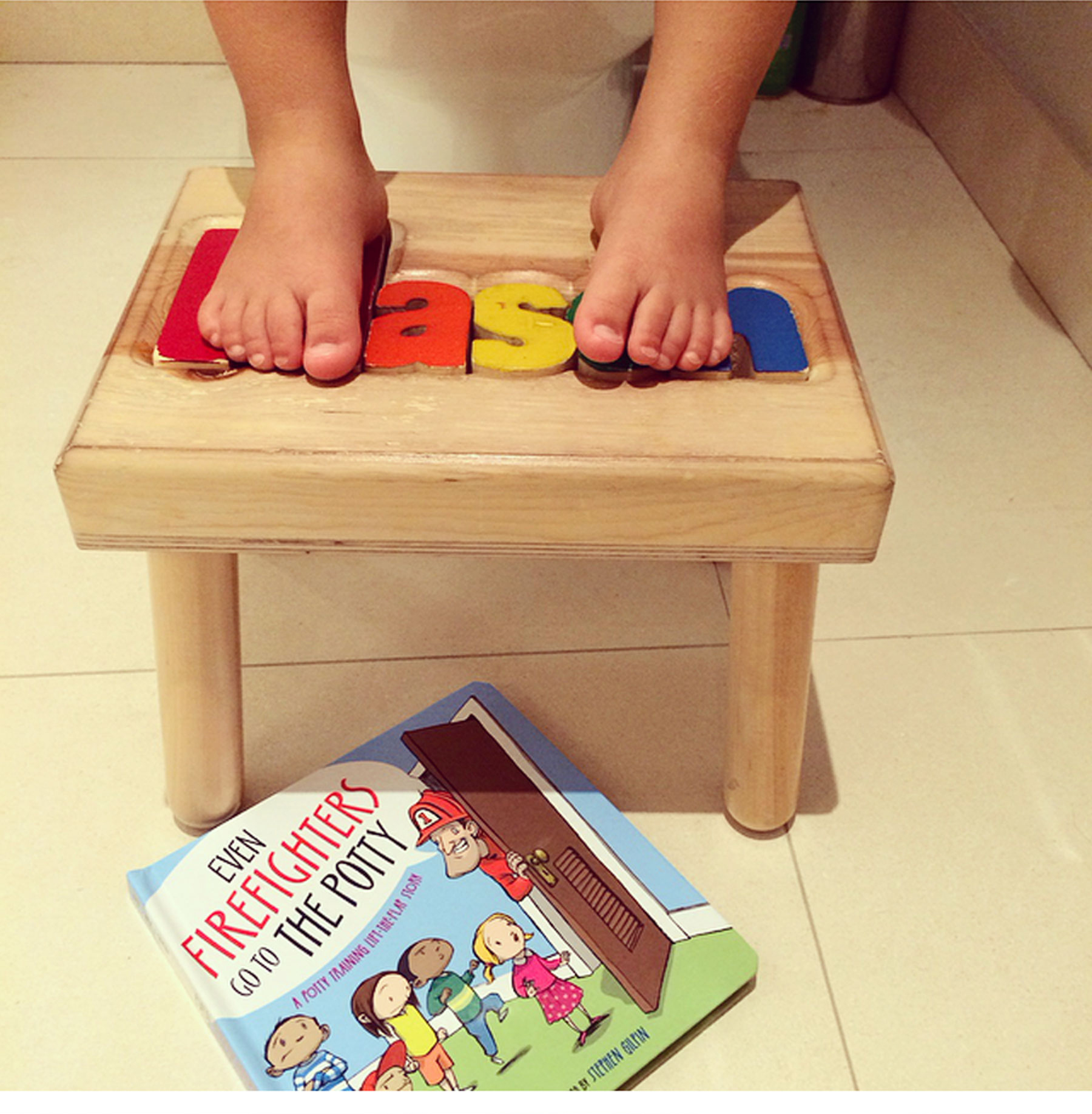 A Day in the Life of Ceci Johnson - 6:45 AM Here comes the not-so-glamourous part of the day. Having a toddler means morning potty training! I'm in full mom mode reading him the book 'Even Firefighters Go to the Potty' and coaching him along.