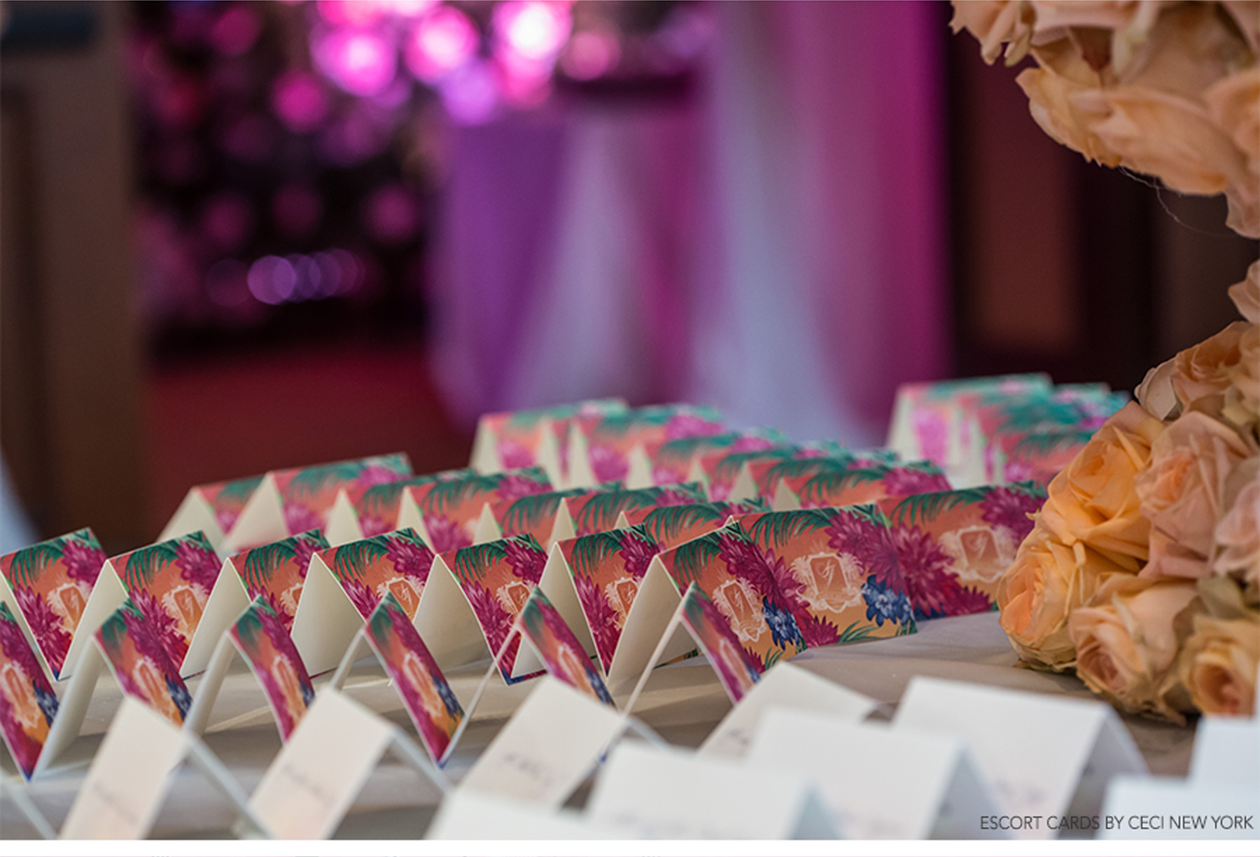 Our Muse - Sunny, Tropical Wedding in Florida - Be inspired by Sally & Javier's vibrant, tropical wedding in Florida - tropical wedding, wedding inspiration, colorful, florida wedding, ceci new york, escort cards, table signs, watercolor, colorful, palm trees, flowers, centerpieces, cake, pink, purple, bride, groom, custom